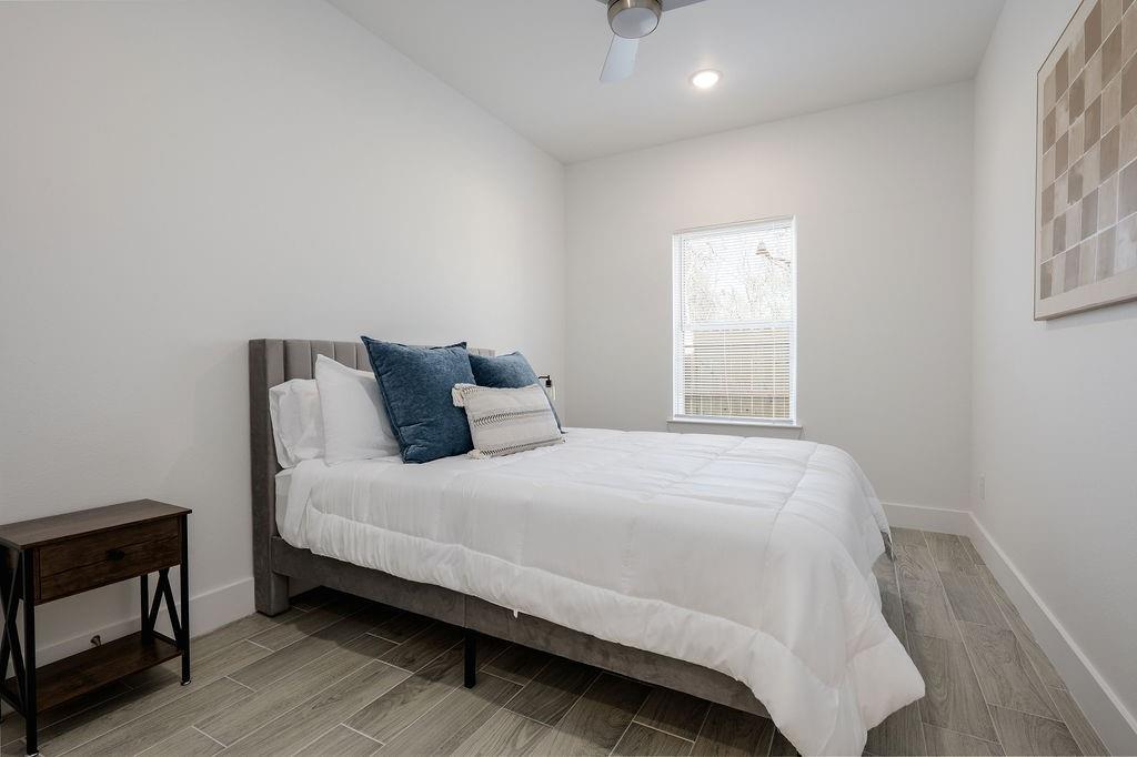 709 Fuller Street Sulphur Springs, TX 75482 - Photo 16 of 22 a bedroom with a bed and a tv