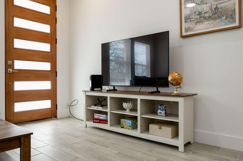 709 Fuller Street Sulphur Springs, TX 75482 - Photo 7 of 22 a living room with hard wood floors and a window