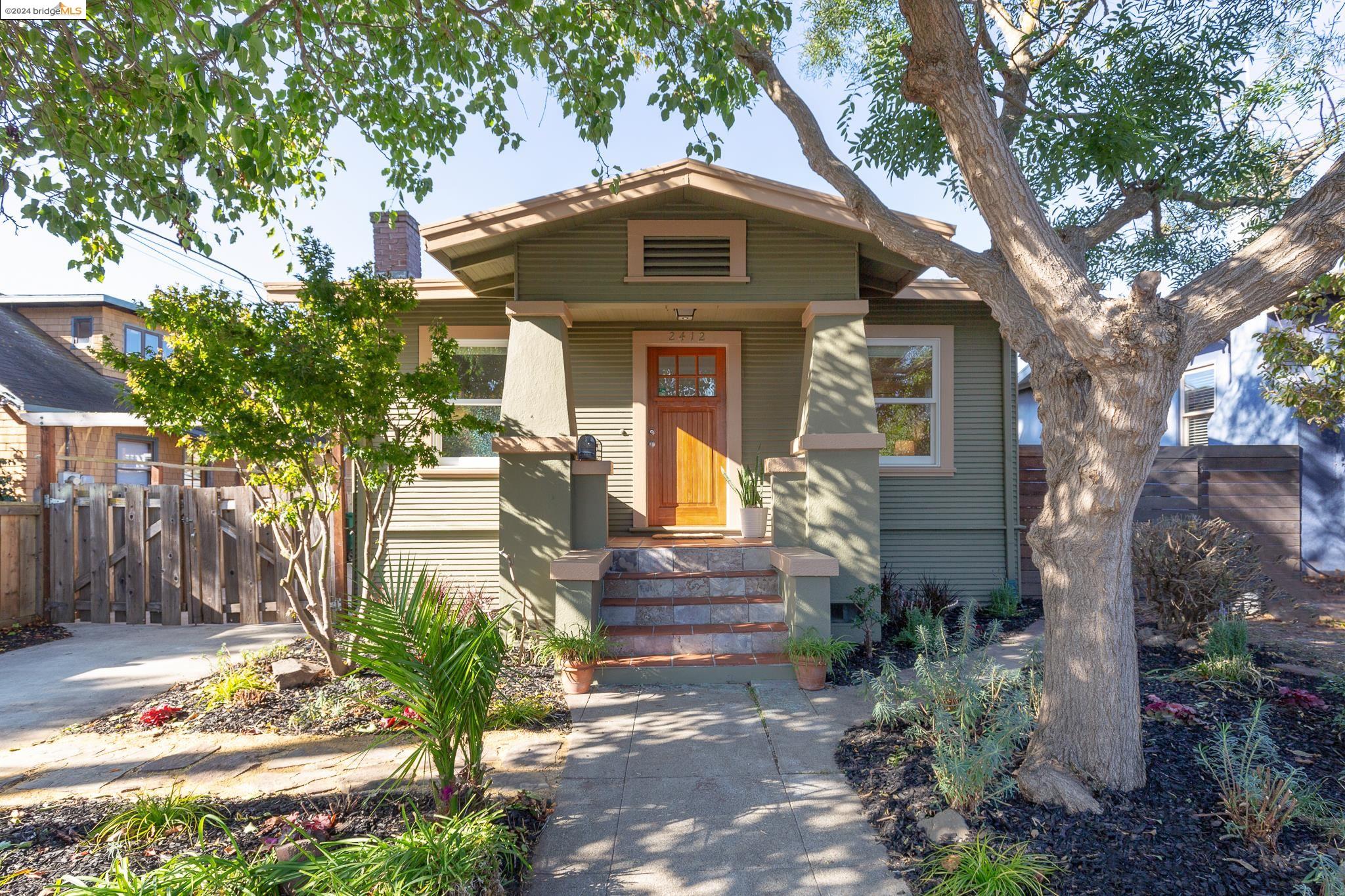 2412 Acton Street Berkeley, CA 94702 - Photo 1 of 1 a front view of a house with garden