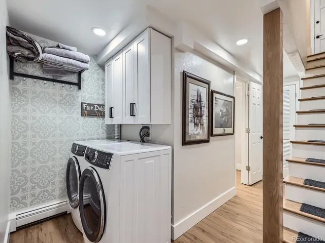 a utility room with dryer and washer