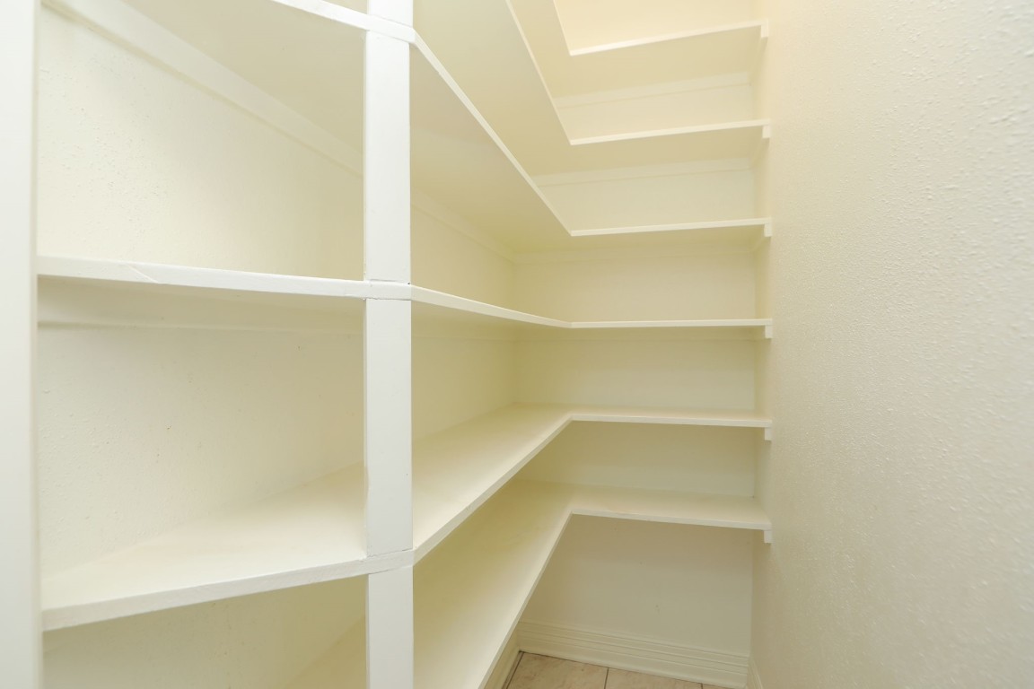7499 Brompton Street, Unit 7499 Houston, TX 77025 - Photo 23 of 43 a view of staircase with white walls