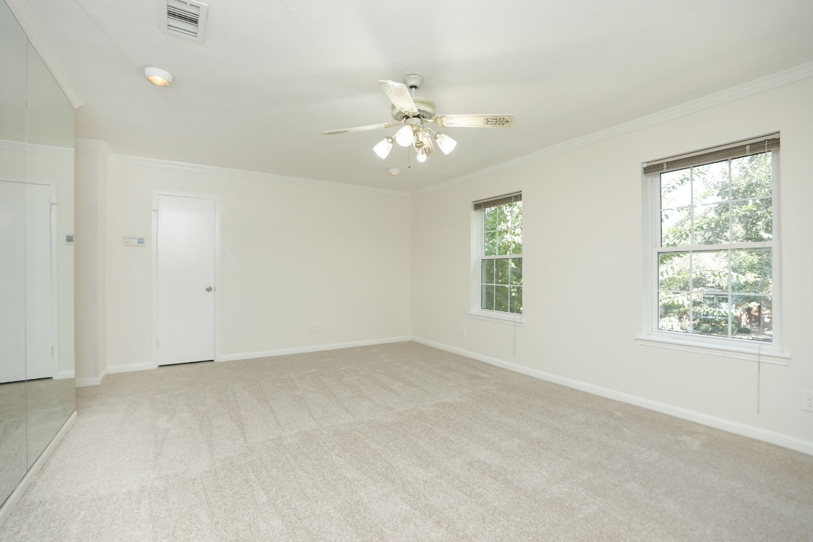 7499 Brompton Street, Unit 7499 Houston, TX 77025 - Photo 25 of 43 a view of an empty room with a window