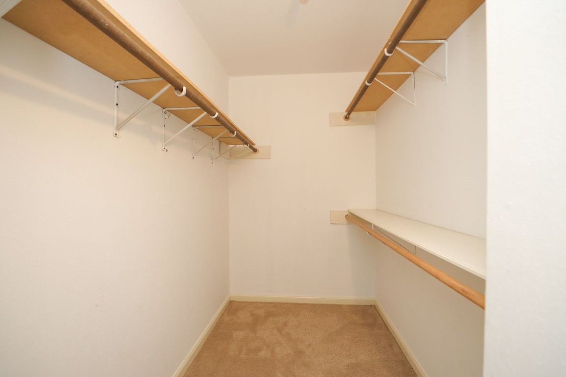 7499 Brompton Street, Unit 7499 Houston, TX 77025 - Photo 35 of 43 a view of walk in closet