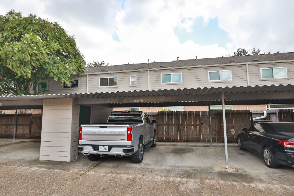 7499 Brompton Street, Unit 7499 Houston, TX 77025 - Photo 43 of 43 a car parked in front of a house