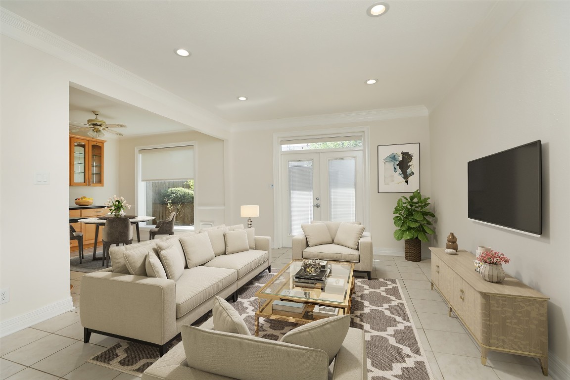 7499 Brompton Street, Unit 7499 Houston, TX 77025 - Photo 9 of 43 a living room with furniture and a flat screen tv