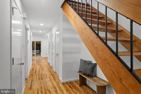 a kitchen with stainless steel appliances a refrigerator and a sink