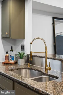 a view of a living room and a window with wooden floor