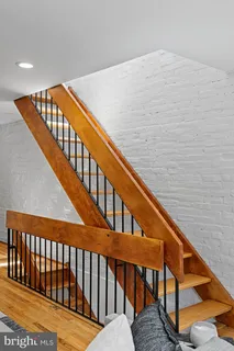 a bathroom with a granite countertop sink tub and shower
