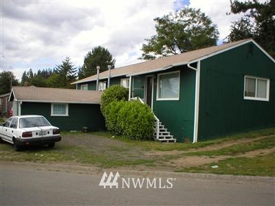226 Oak Street Bremerton, WA 98310 - Photo 1 of 1 a front view of a house with a garden