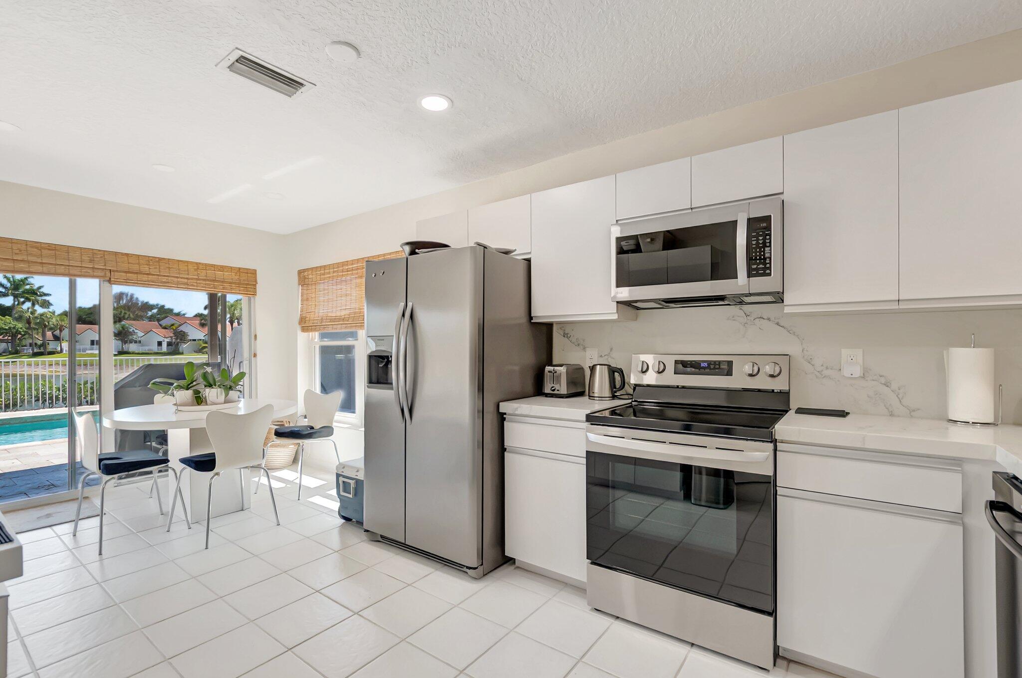 7287 Via Palomar Boca Raton, FL 33433 - Photo 13 of 47 Kitchen and breakfast area