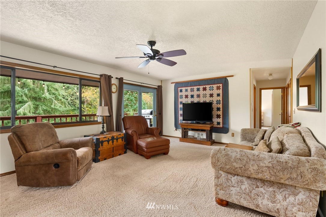 237 Frogner Road Chehalis, WA 98532 - Photo 6 of 37 a living room with furniture and a large window