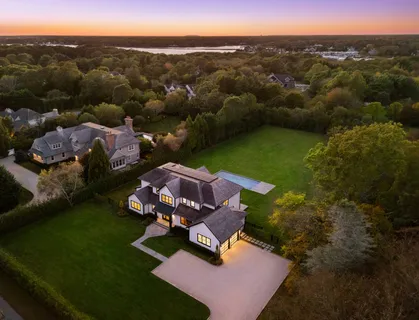 an aerial view of a house with a garden