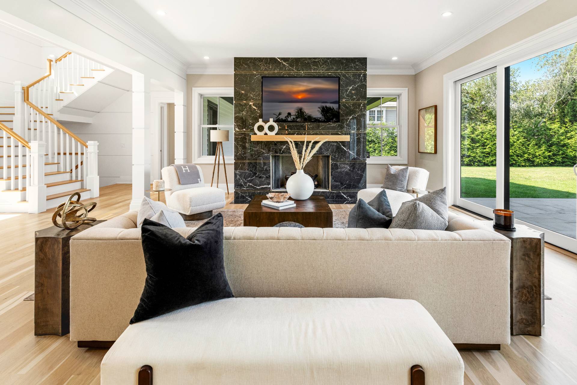 21 Cedar Lane Remsenburg, NY 11960 - Photo 11 of 50 a living room with furniture a flat screen tv and a floor to ceiling window