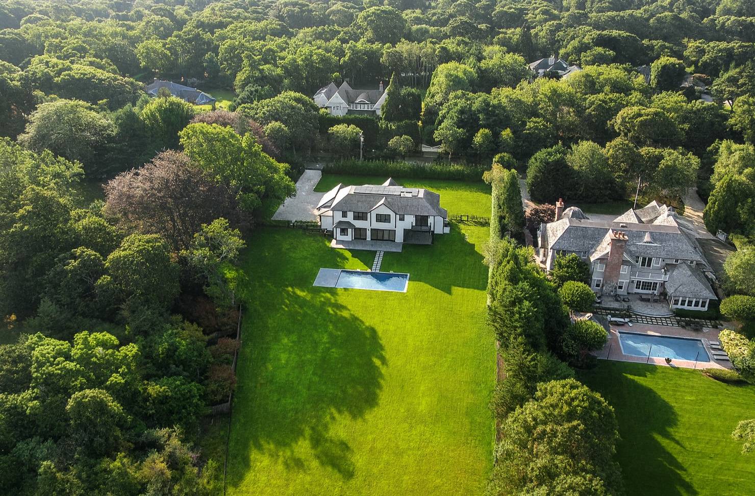 21 Cedar Lane Remsenburg, NY 11960 - Photo 21 of 50 a aerial view of a house with a yard swimming pool and outdoor seating