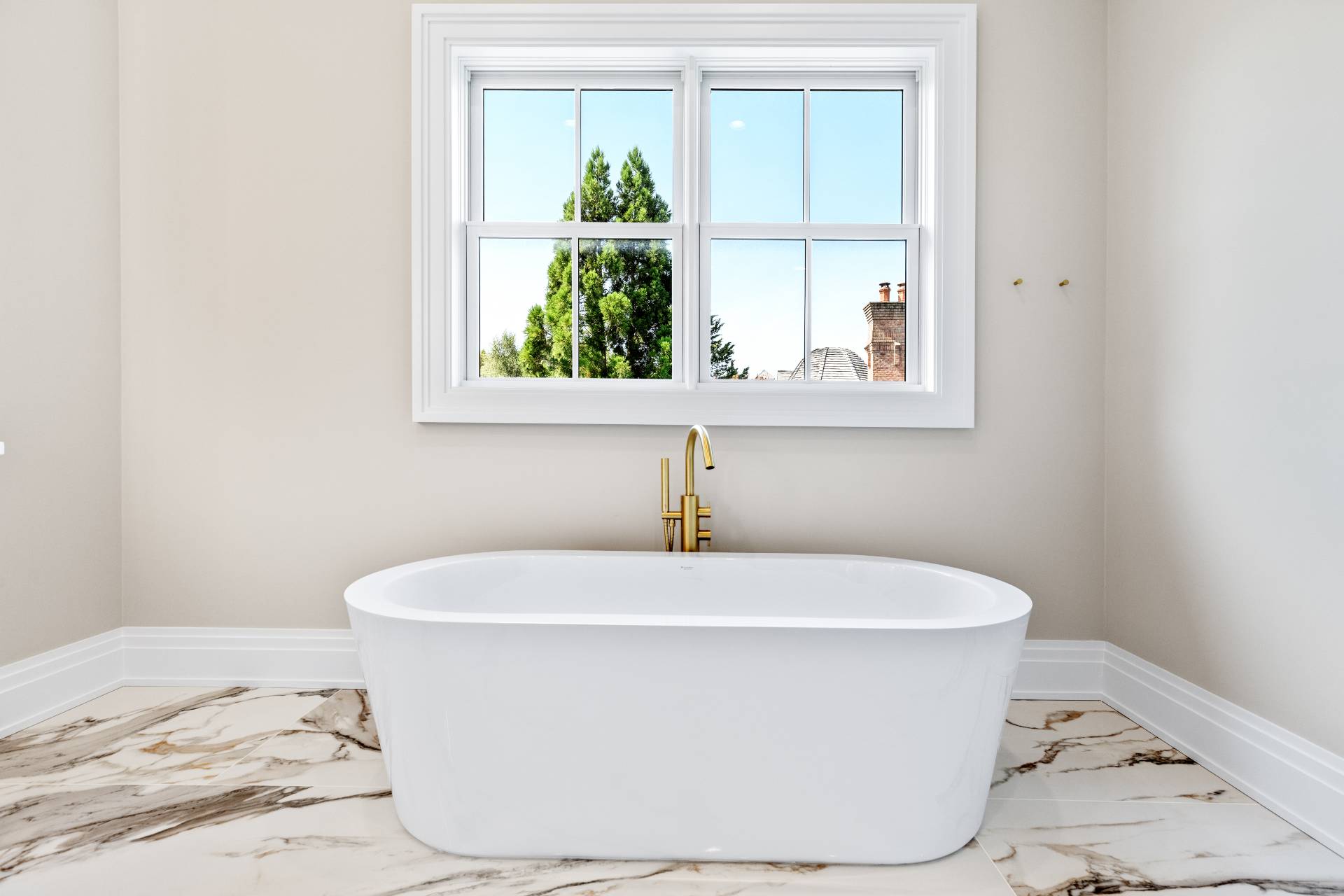 21 Cedar Lane Remsenburg, NY 11960 - Photo 36 of 50 a white bath tub sitting in a bathroom
