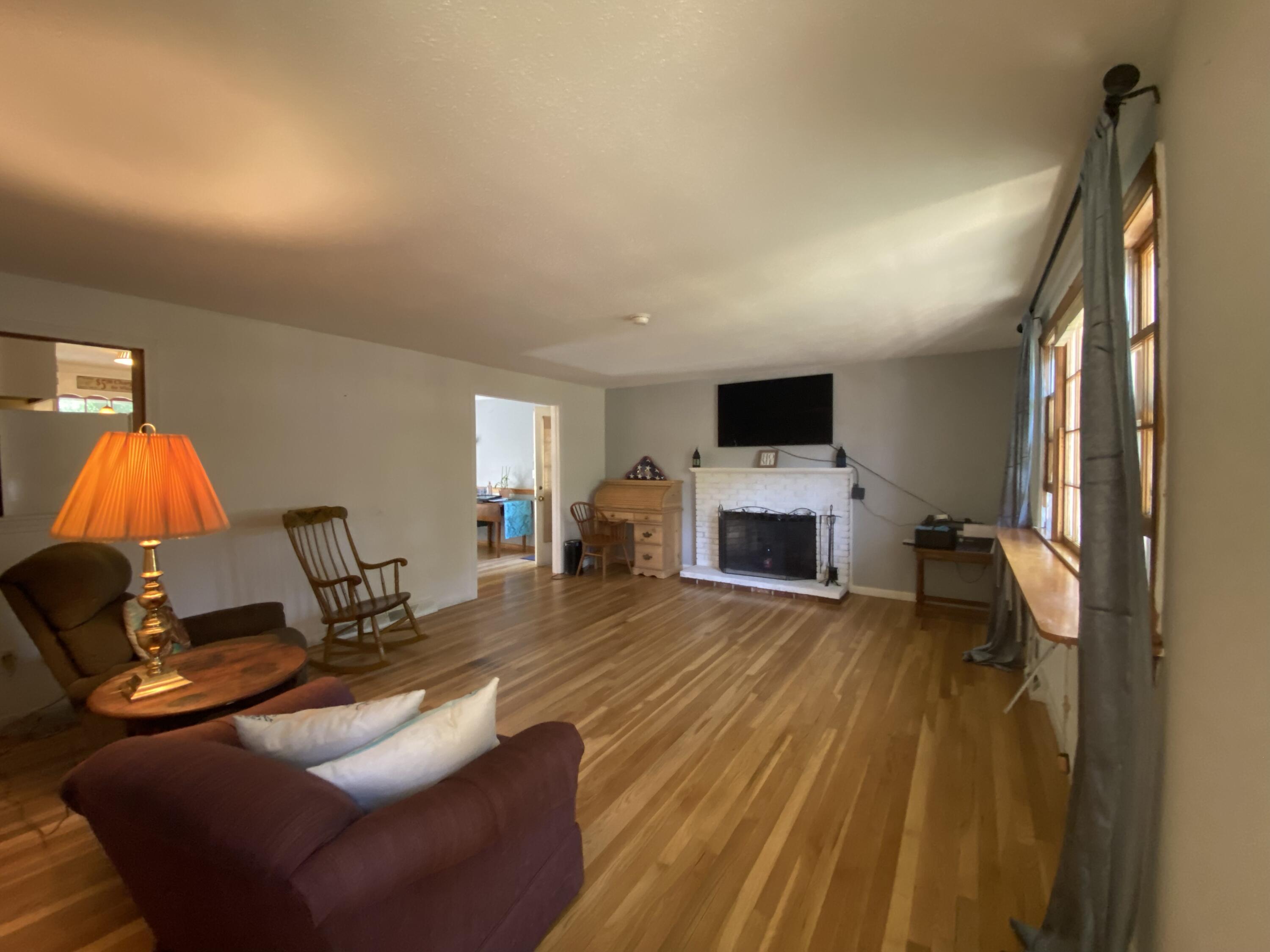 289 Megan Road Hyannis, MA 02601 - Photo 16 of 20 a living room with furniture and a fireplace
