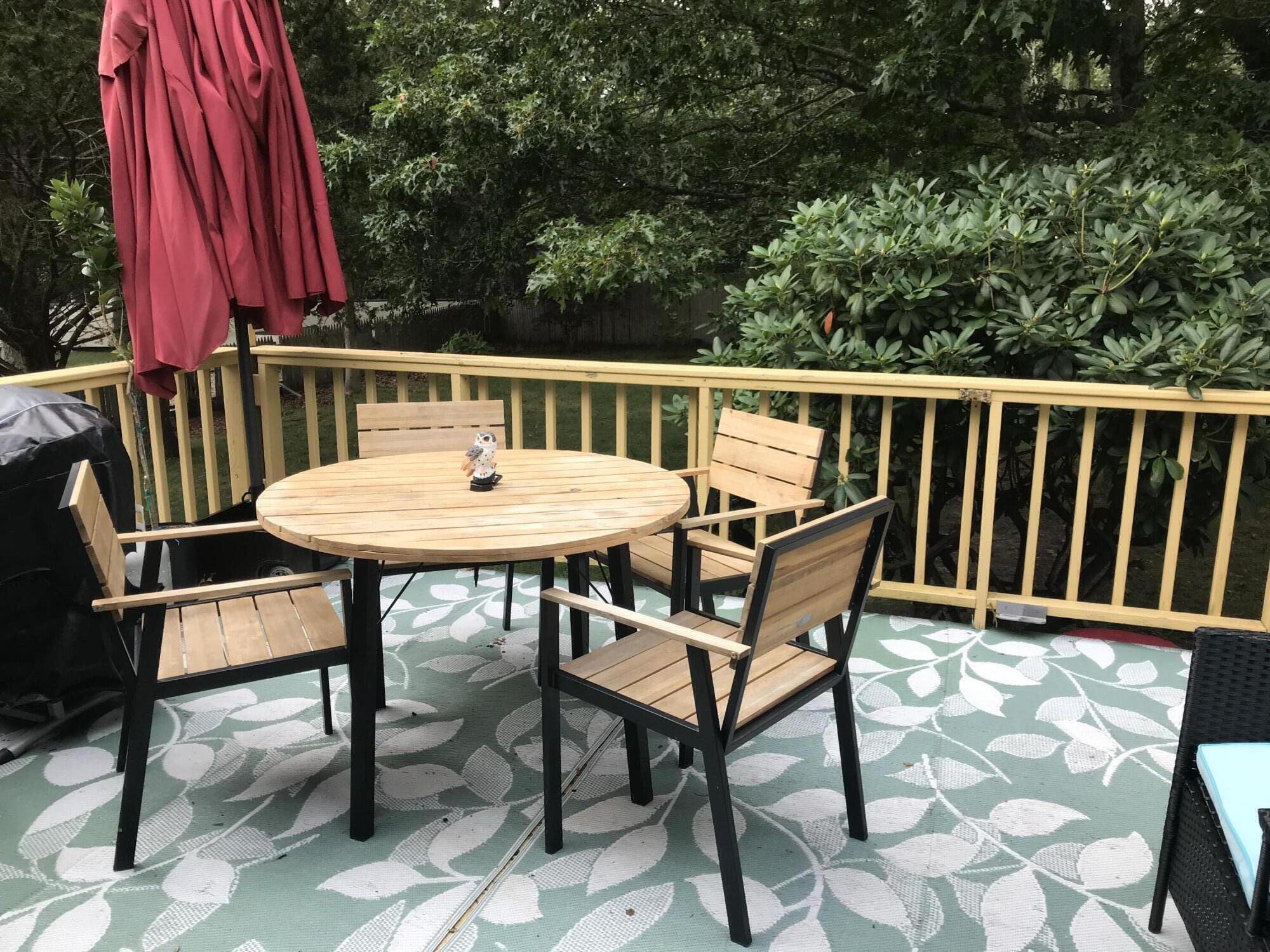 289 Megan Road Hyannis, MA 02601 - Photo 8 of 20 a roof deck with a table and chairs