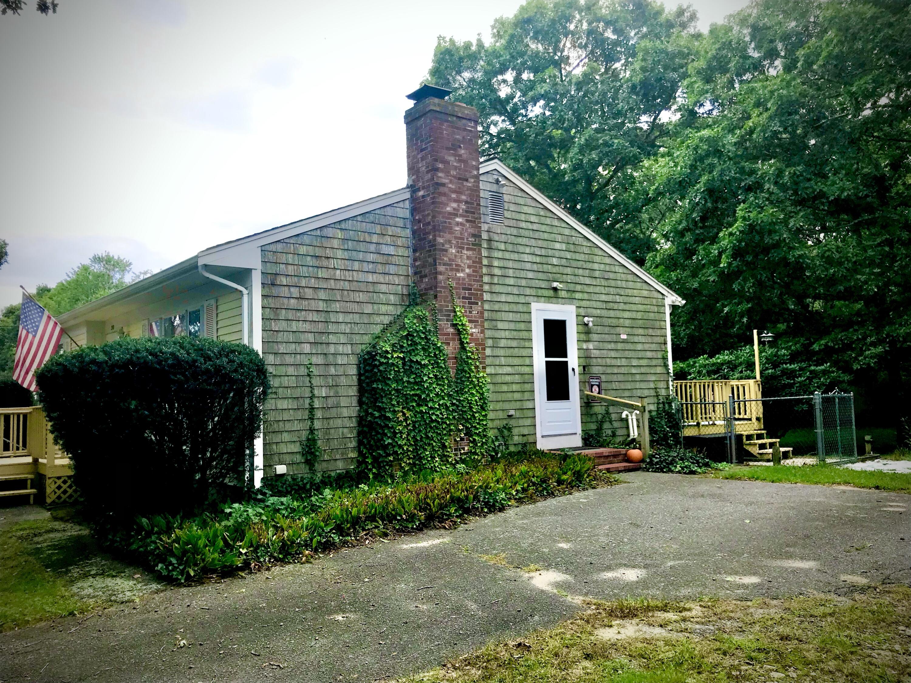289 Megan Road Hyannis, MA 02601 - Photo 9 of 20 a view of a house with a garden