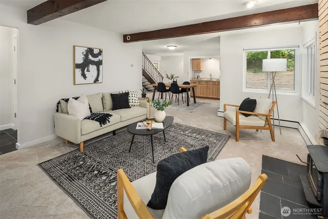 a living room with furniture and a table