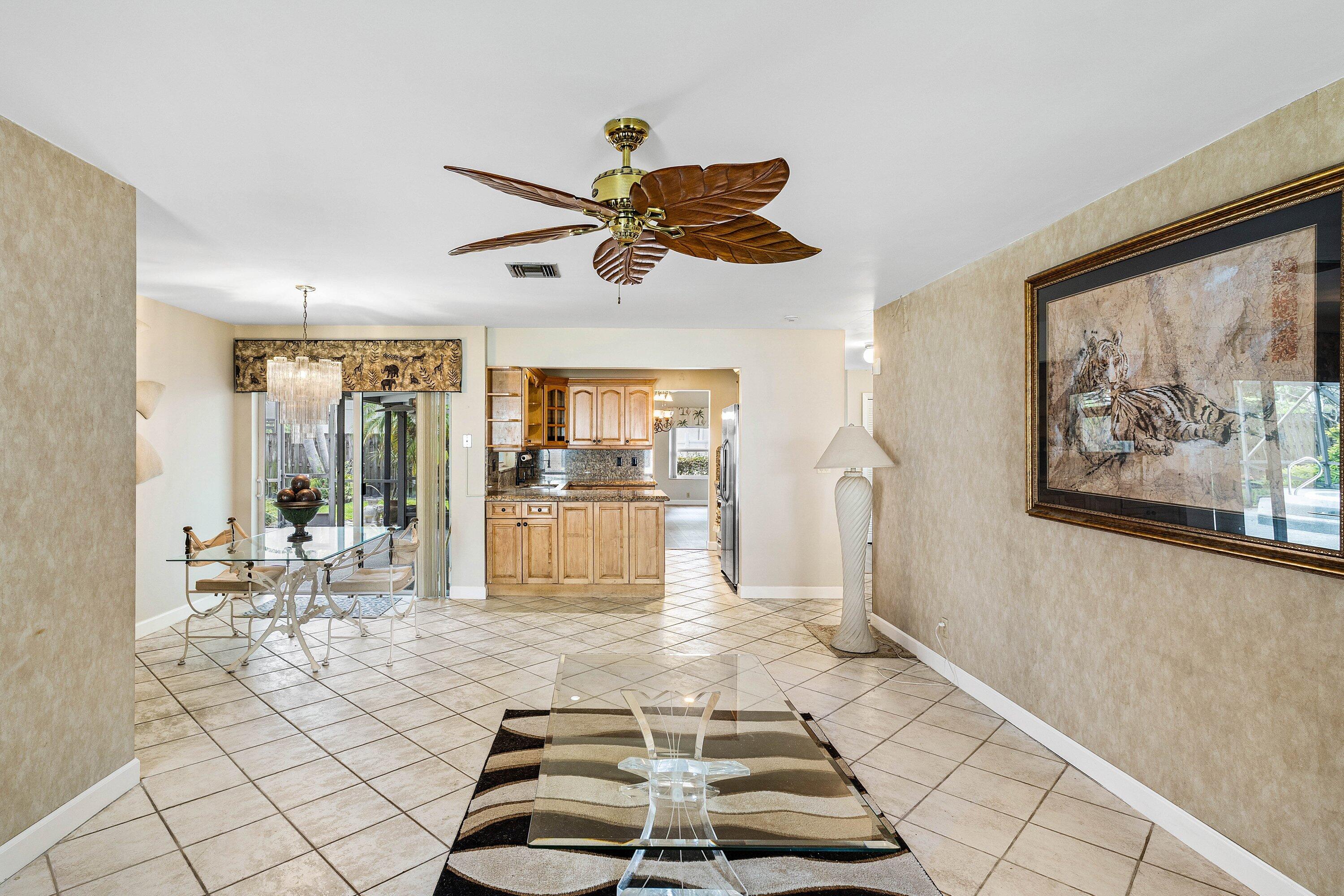 3068 Northwest 25th Way Boca Raton, FL 33434 - Photo 14 of 43 a living room with a couch