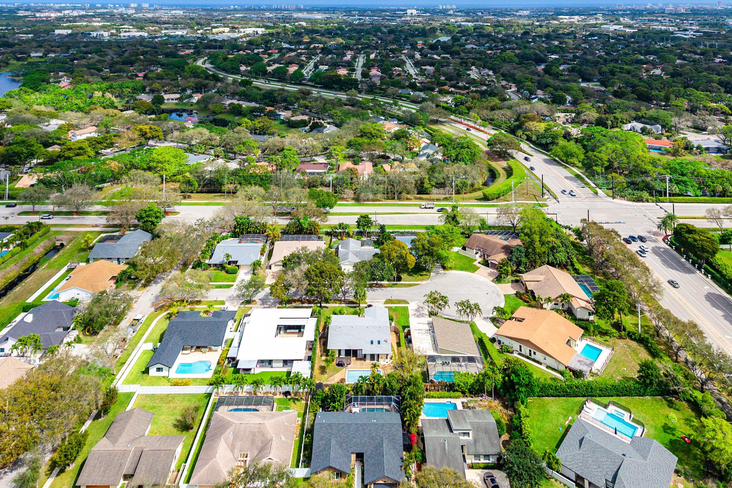 3068 Northwest 25th Way Boca Raton, FL 33434 - Photo 32 of 43 an aerial view of residential houses with outdoor space