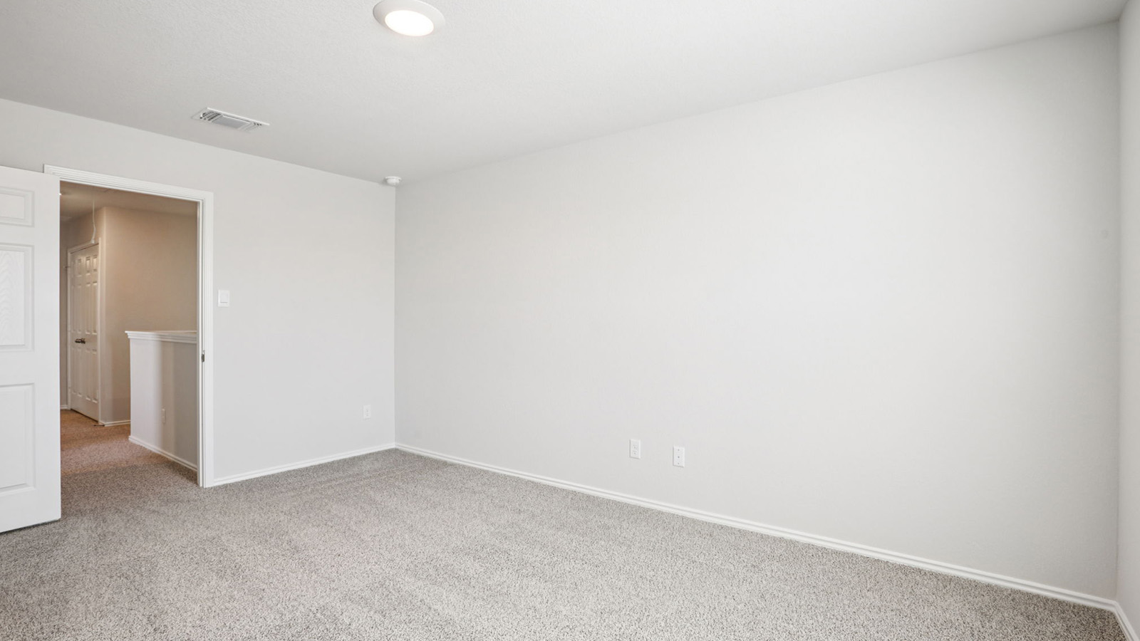 133 Wyatt Way Jarrell, TX 76537 - Photo 16 of 32 Carpeted room with light neutral walls, white baseboards, and a flush-mount ceiling light fixture