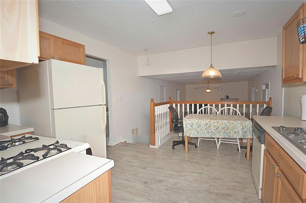 5799 Cedar Croft Lane Lithonia, GA 30058 - Photo 9 of 16 a bedroom with a bed and a table chair