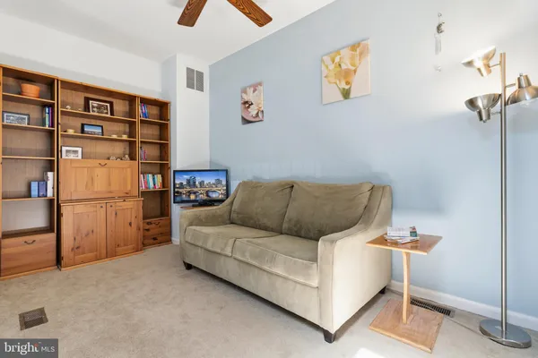 a living room with furniture and a couch