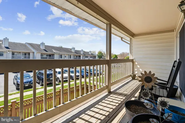 a view of balcony with furniture