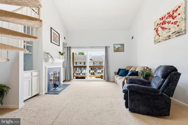 a bed room with a bed and a chair