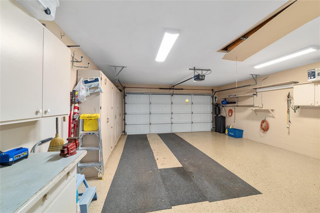 9240 Southwest 90th Court, Unit B Ocala, FL 34481 - Photo 36 of 40 a view of a garage with storage