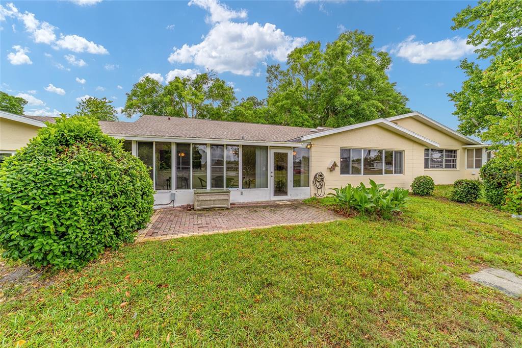 9240 Southwest 90th Court, Unit B Ocala, FL 34481 - Photo 40 of 40 front view of a house with a yard