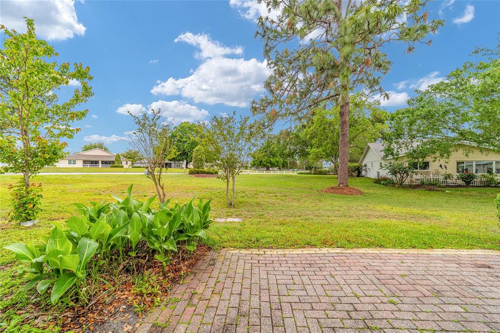 9240 Southwest 90th Court, Unit B Ocala, FL 34481 - Photo 5 of 40 a view of a ocean with a building in the background