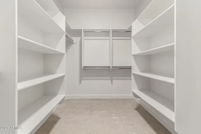 a view of an empty walk in closet