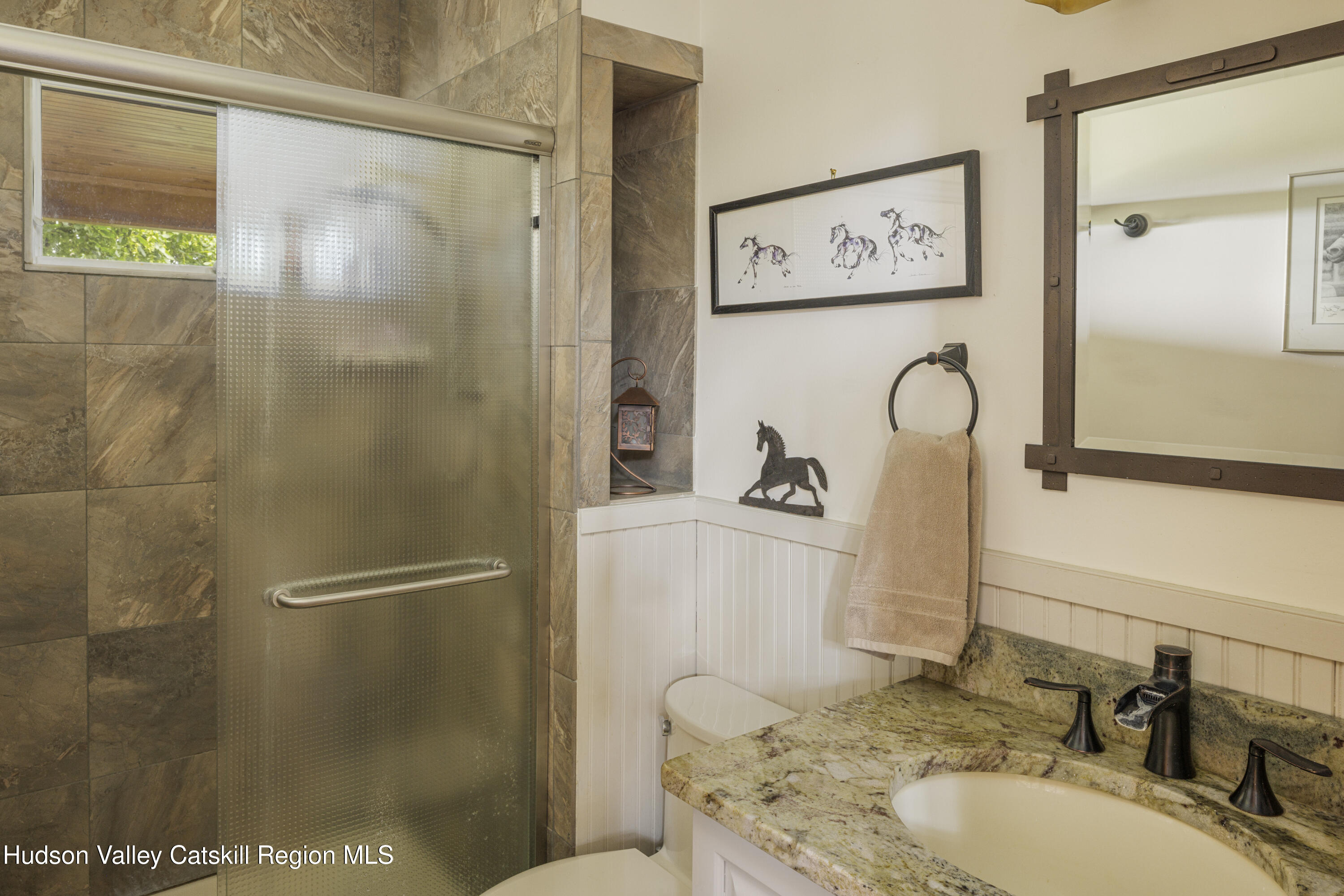 48 County Rte 14 Hudson, NY 12534 - Photo 12 of 42 a bathroom with a granite countertop sink toilet and shower