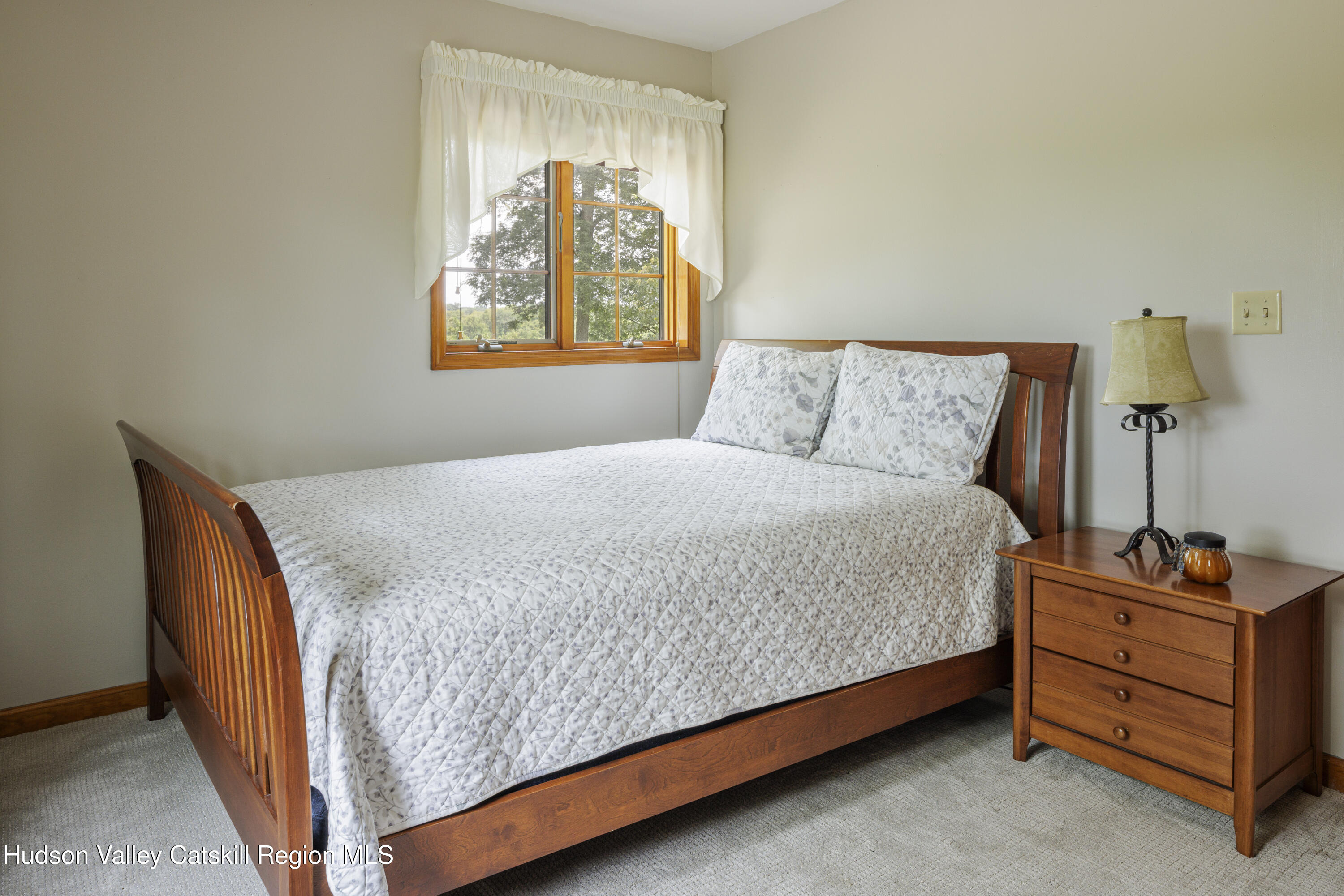 48 County Rte 14 Hudson, NY 12534 - Photo 16 of 42 a bedroom with a bed and window