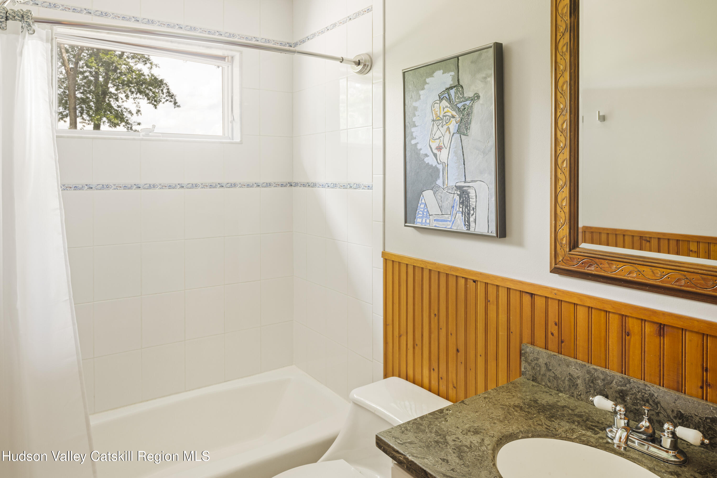 48 County Rte 14 Hudson, NY 12534 - Photo 17 of 42 a bathroom with a sink and a mirror