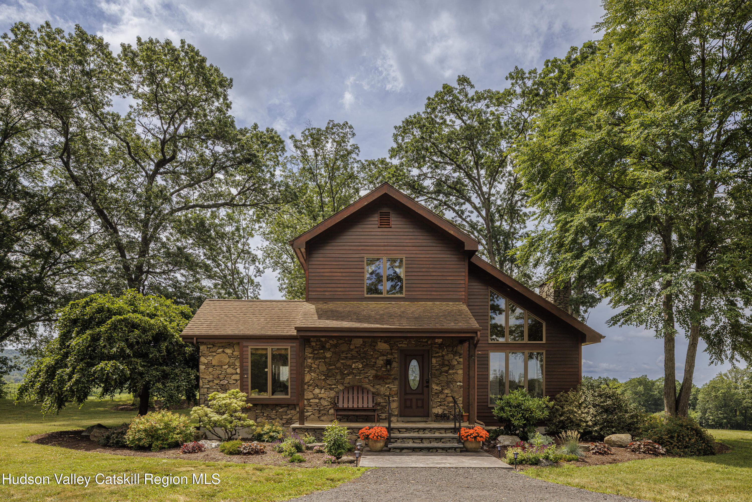 48 County Rte 14 Hudson, NY 12534 - Photo 2 of 42 a front view of a house with garden