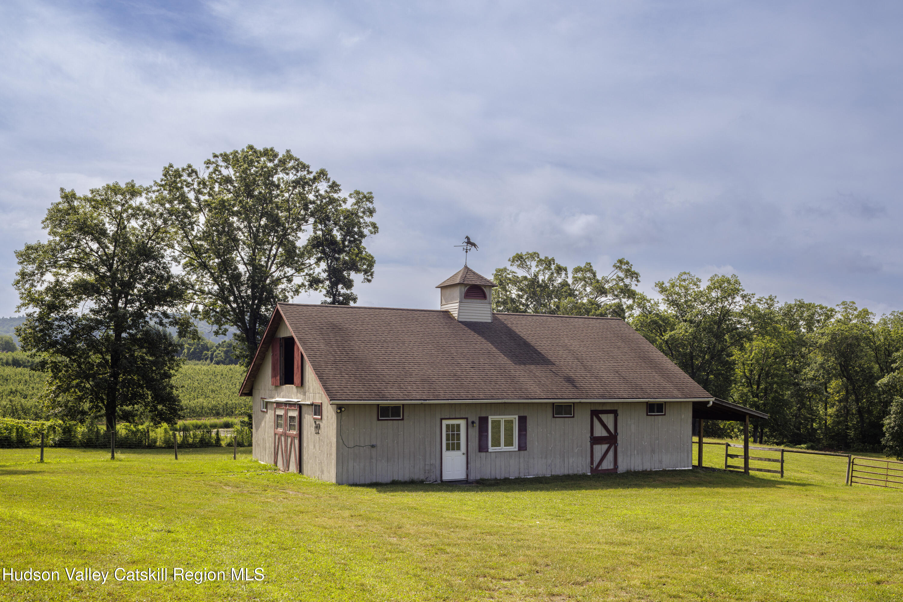48 County Rte 14 Hudson, NY 12534 - Photo 23 of 42 a house with swimming pool in front of it