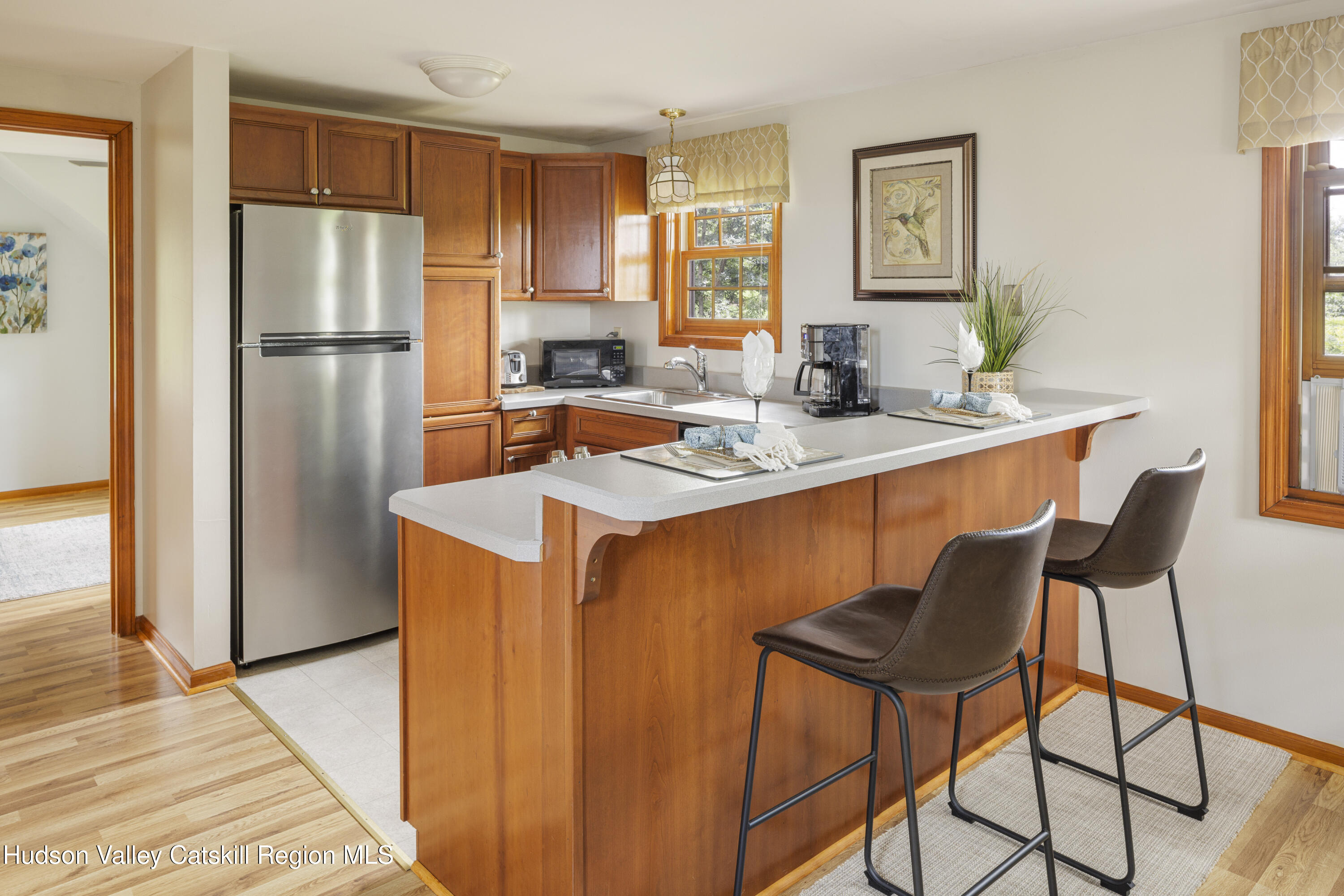 48 County Rte 14 Hudson, NY 12534 - Photo 35 of 42 a kitchen with stainless steel appliances granite countertop a refrigerator and a stove top oven