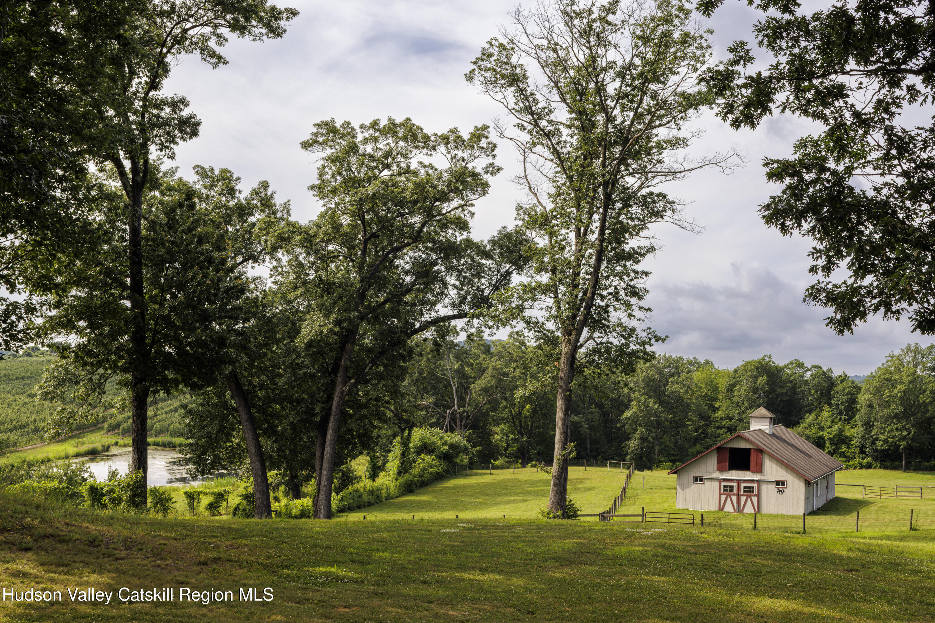 48 County Rte 14 Hudson, NY 12534 - Photo 42 of 42 a view of a town with large trees
