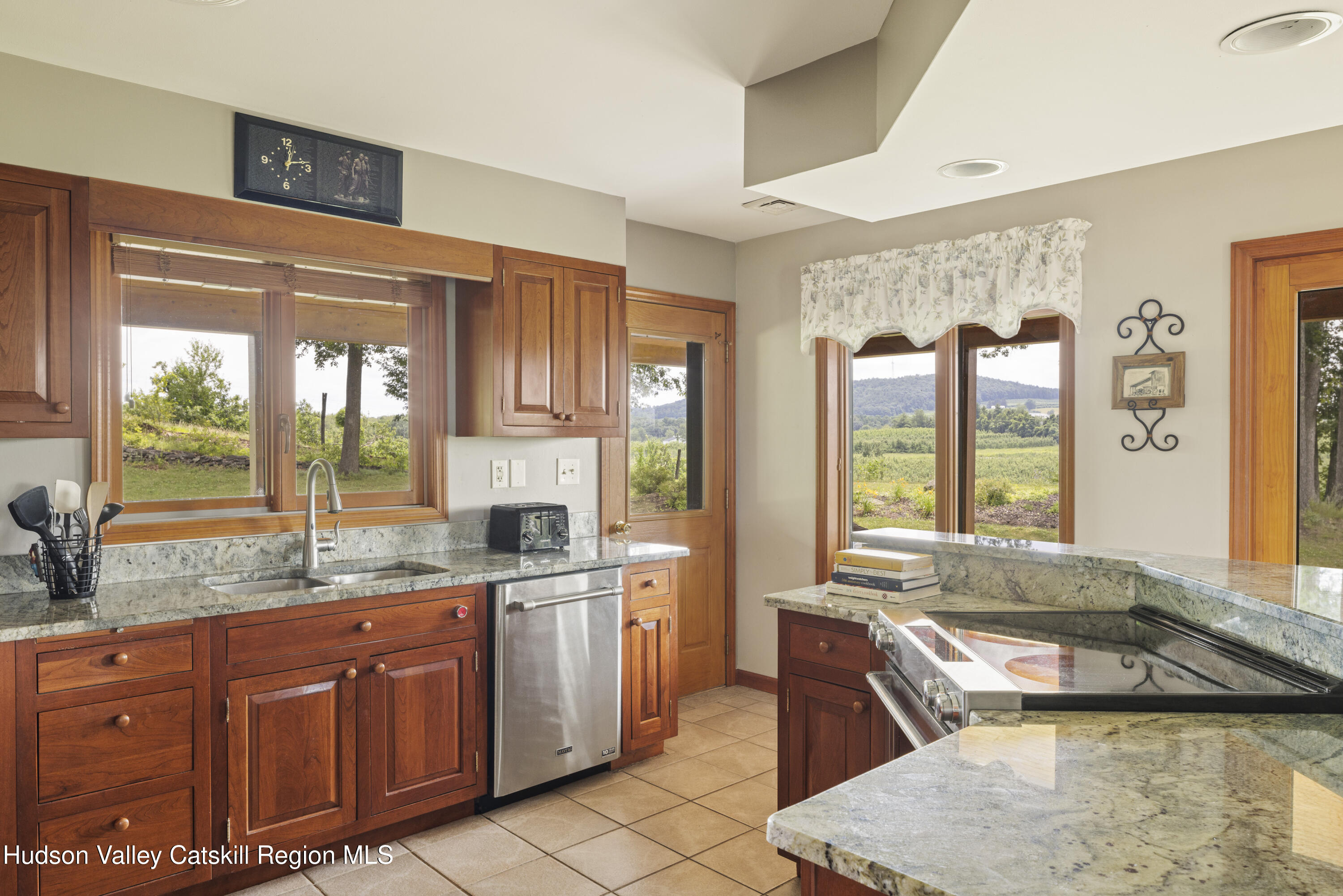 48 County Rte 14 Hudson, NY 12534 - Photo 7 of 42 a large kitchen with kitchen island granite countertop a large window and a sink