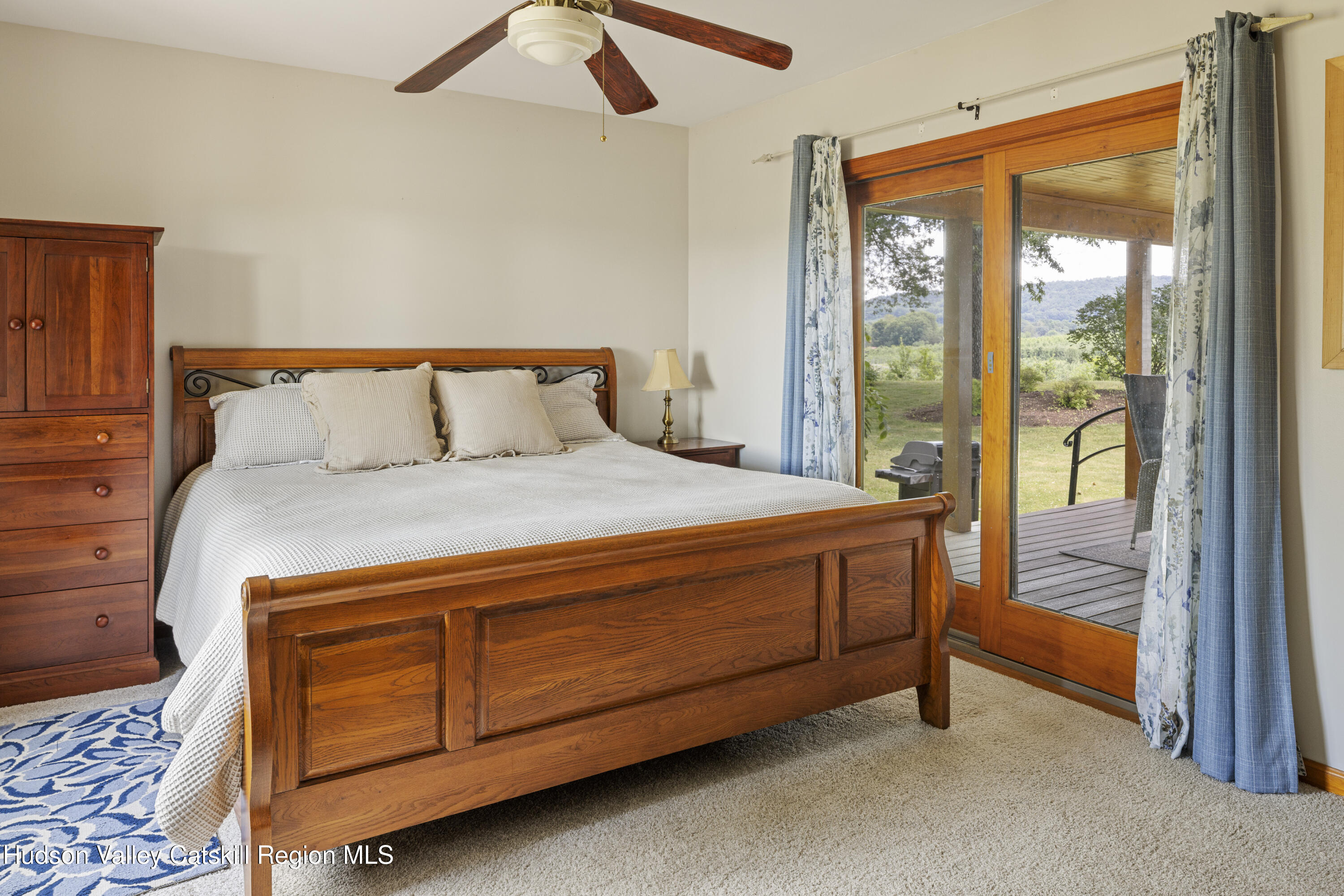 48 County Rte 14 Hudson, NY 12534 - Photo 10 of 42 a bedroom with a bed and large window