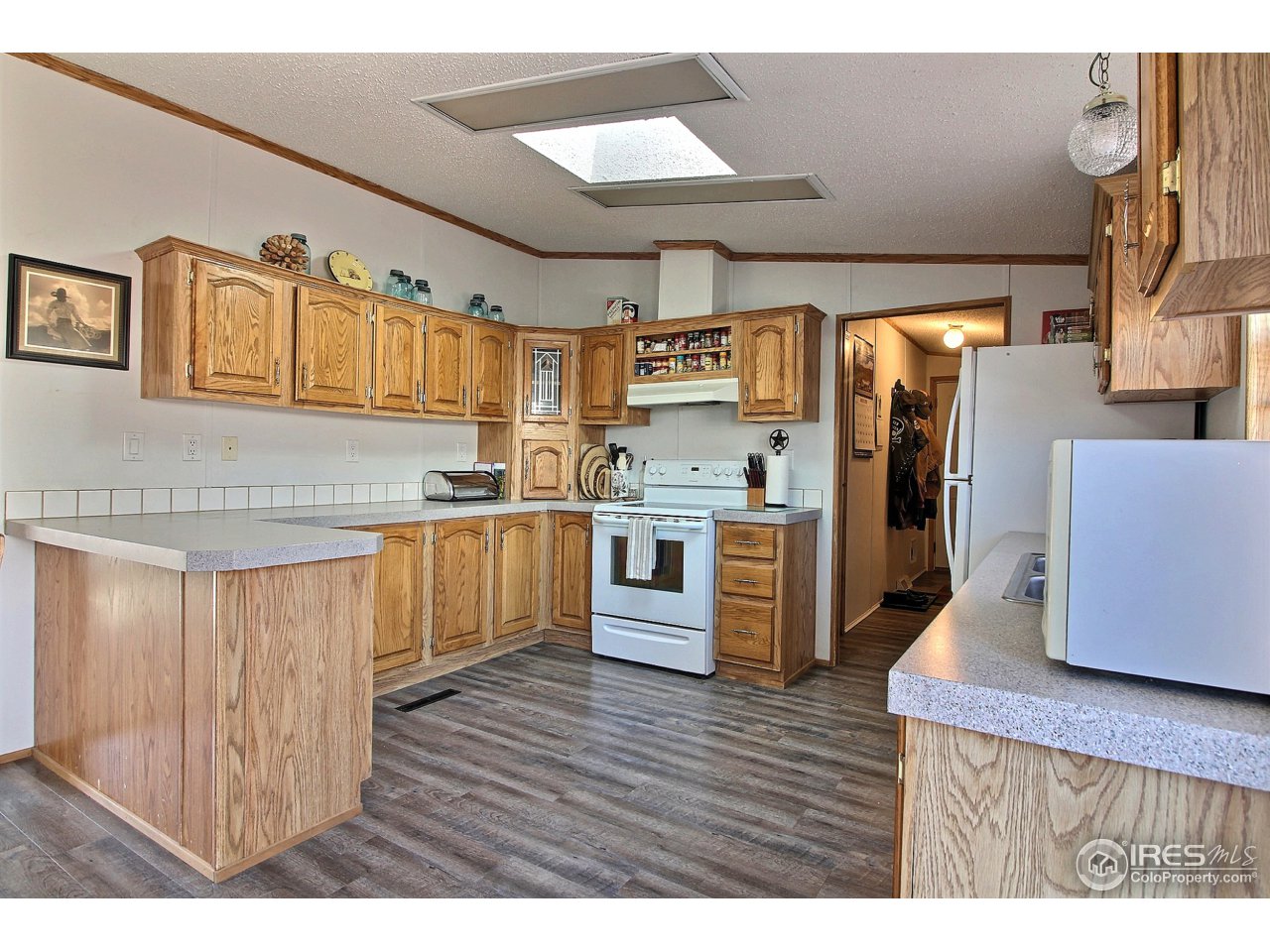 3115 West 3rd Street Road Greeley, CO 80631 - Photo 11 of 29 Kitchen Has A Skylight