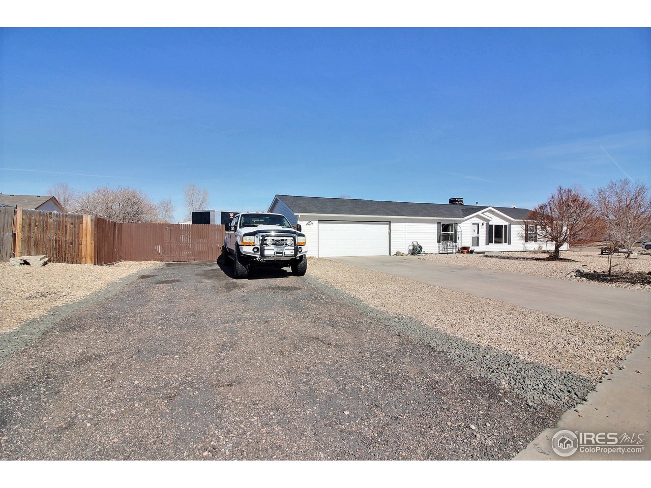 3115 West 3rd Street Road Greeley, CO 80631 - Photo 3 of 29 Oversize 2-Car Garage with Extra Parking