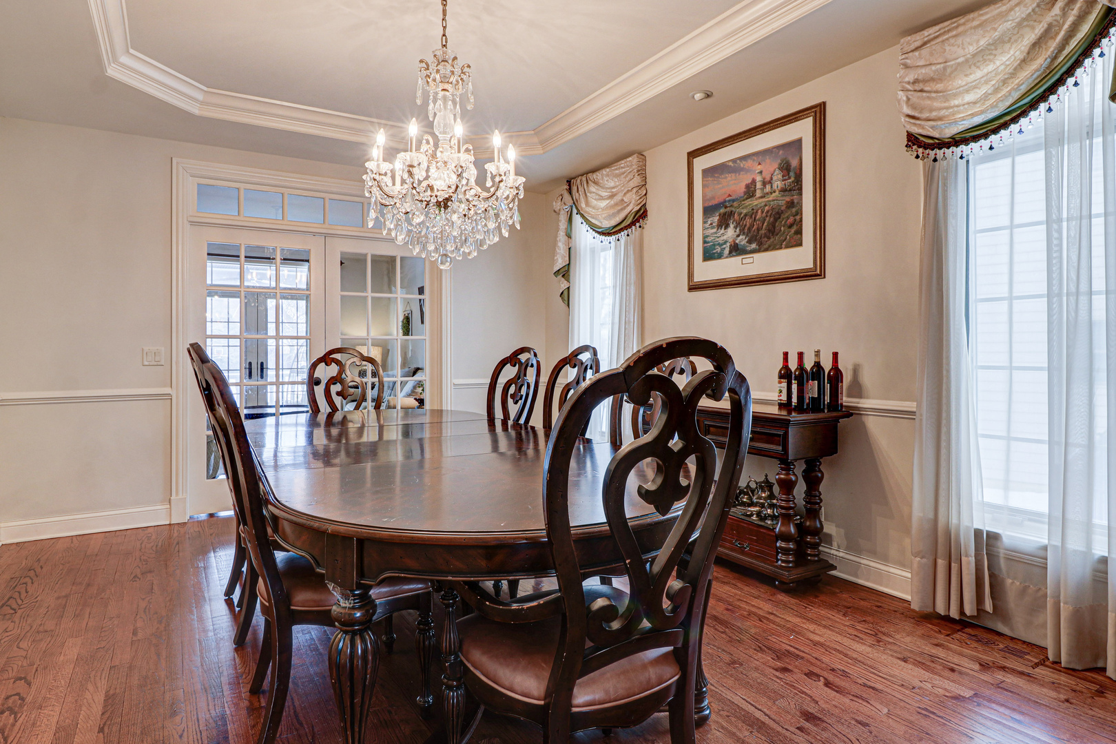 N491 Peter Road Winfield, IL 60190 - Photo 18 of 46 a view of a dining room with furniture and chandelier