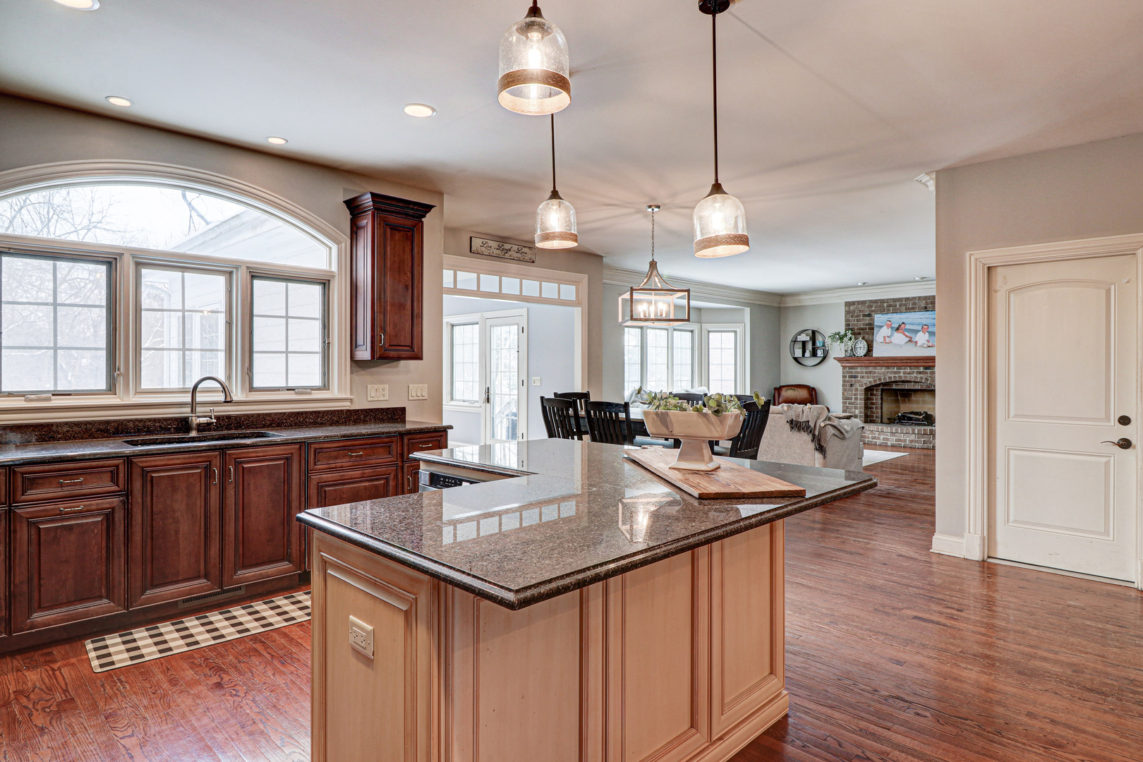 N491 Peter Road Winfield, IL 60190 - Photo 19 of 46 a kitchen with stainless steel appliances granite countertop stove a sink a refrigerator and wooden floor