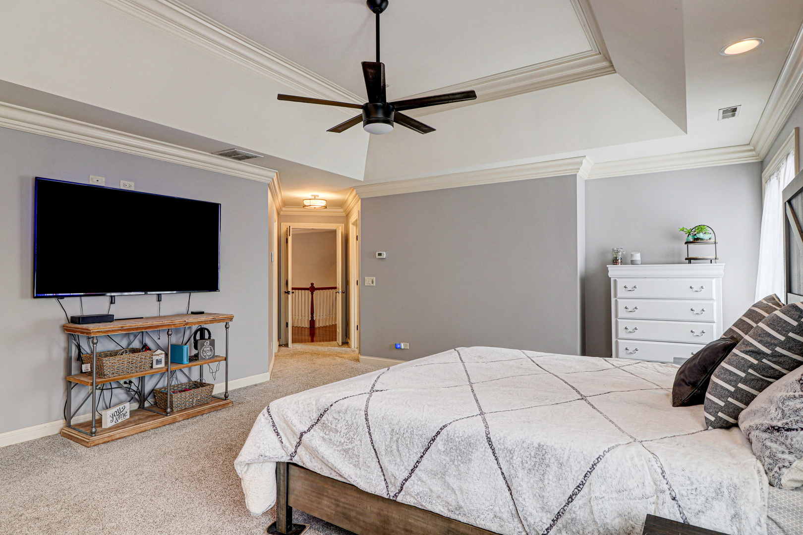 N491 Peter Road Winfield, IL 60190 - Photo 23 of 46 a bedroom with a bed and a flat screen tv