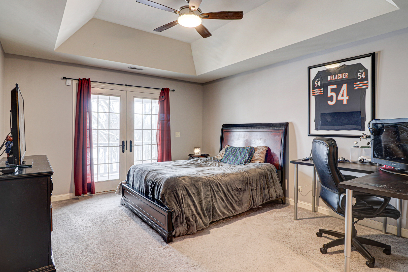 N491 Peter Road Winfield, IL 60190 - Photo 24 of 46 a bedroom with a bed and a chandelier