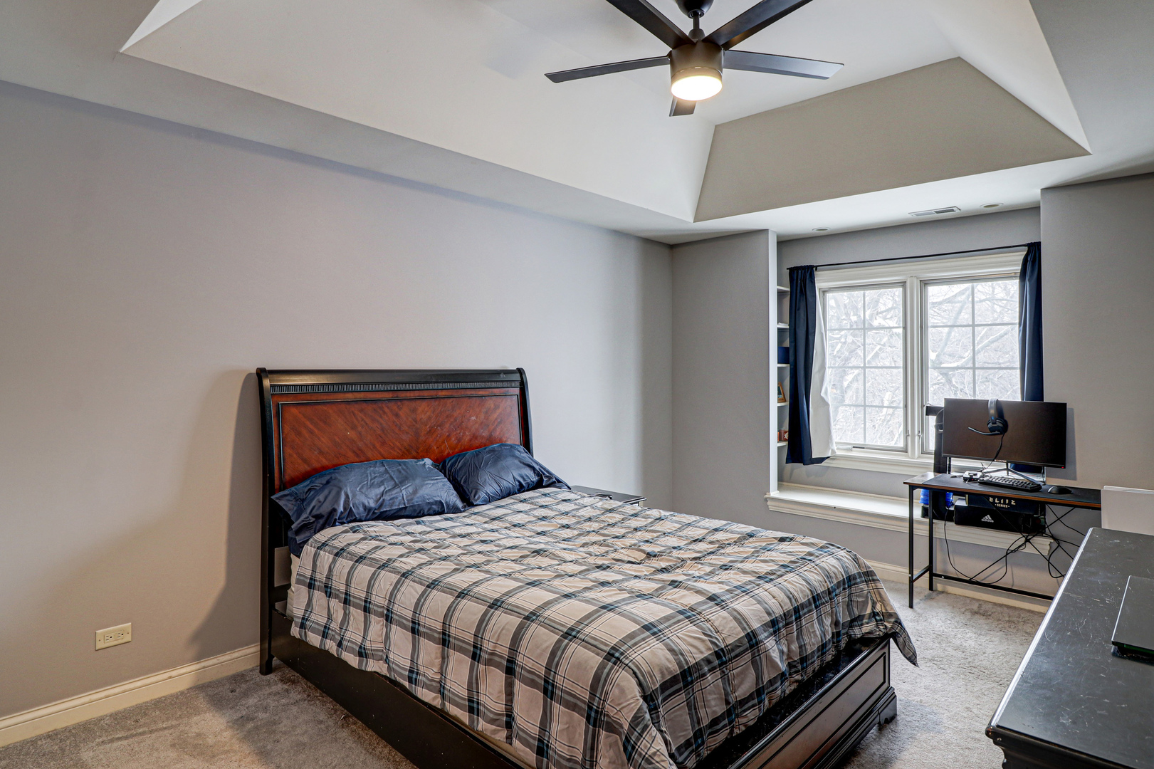 N491 Peter Road Winfield, IL 60190 - Photo 26 of 46 a bedroom with a bed and a flat screen tv